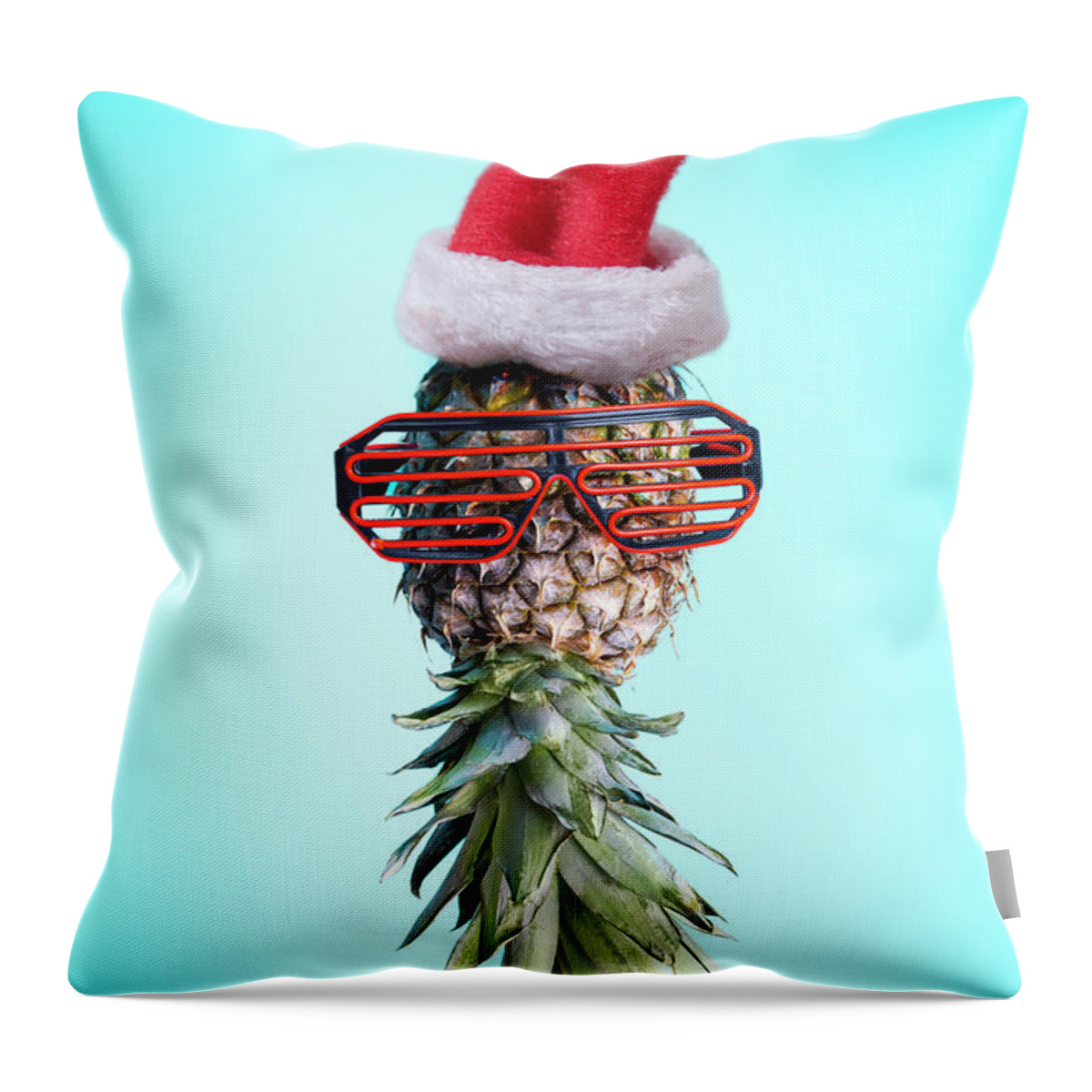 Pineapple Throw Pillow featuring the photograph Santa ananas. Funky pop art minimal christmas in summer concept. by Jelena Jovanovic