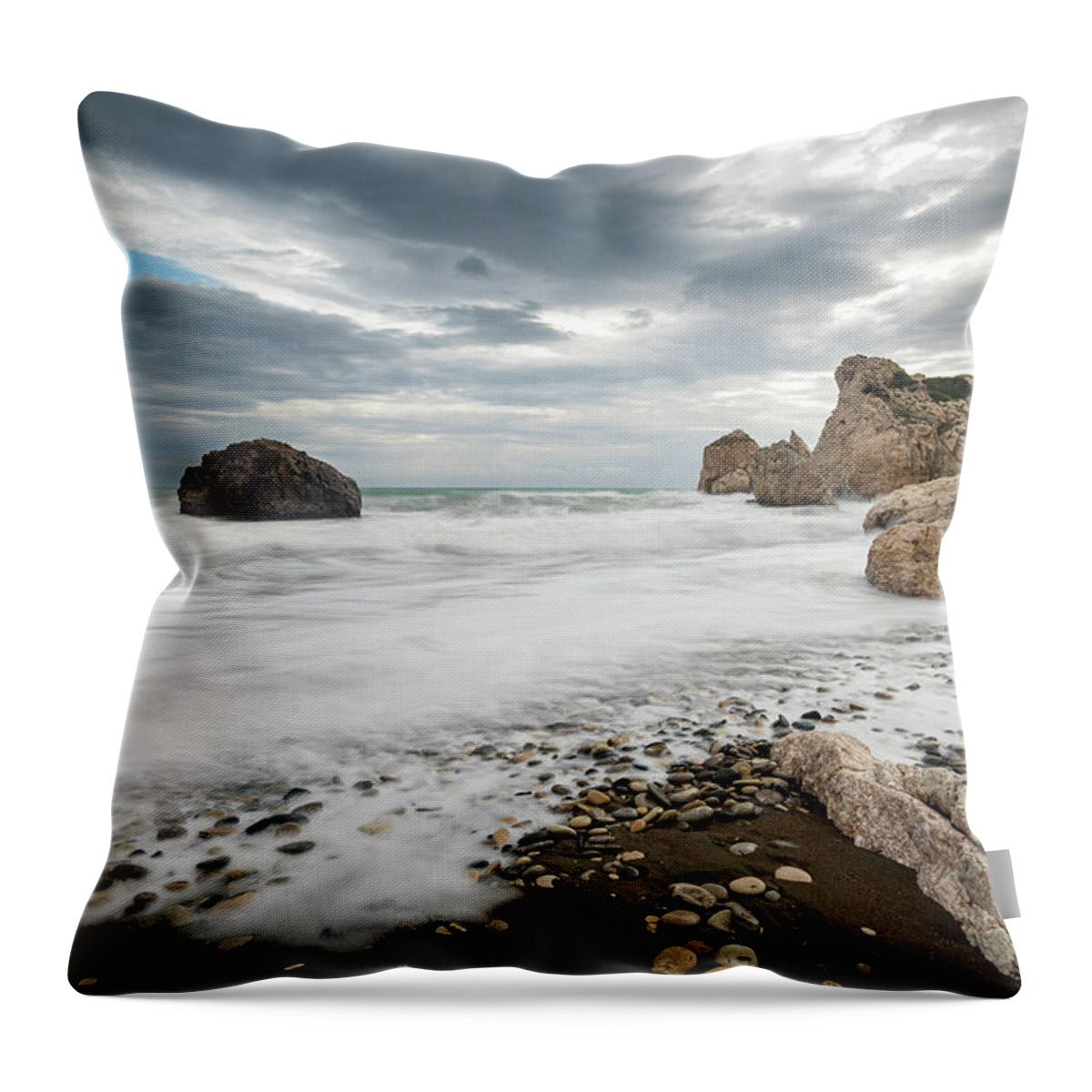 Seascape Throw Pillow featuring the photograph Seascape with windy waves splashing at the rocky coastal area. by Michalakis Ppalis
