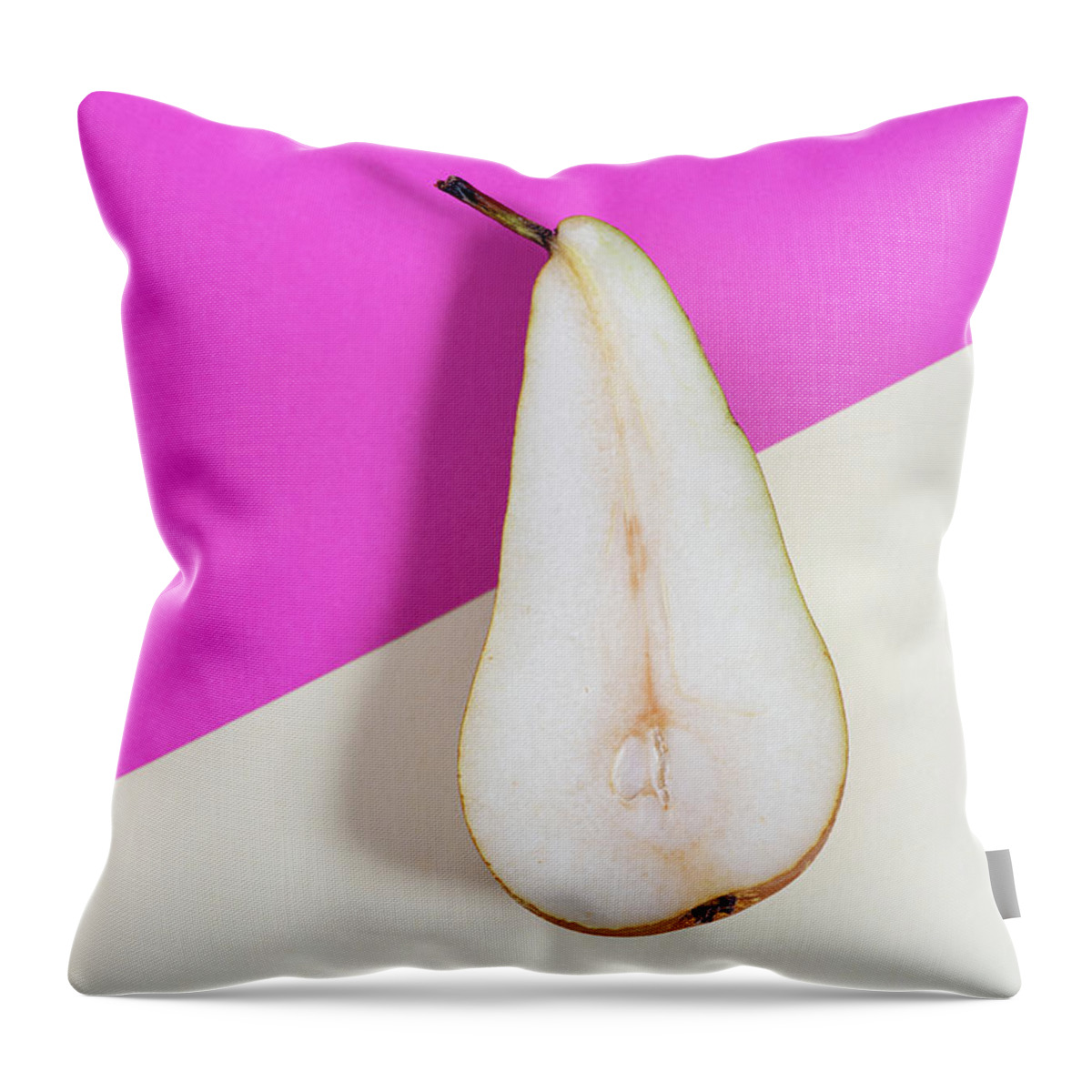 Still-life Throw Pillow featuring the photograph Slice of healthy pear fruit on a colourful background. by Michalakis Ppalis
