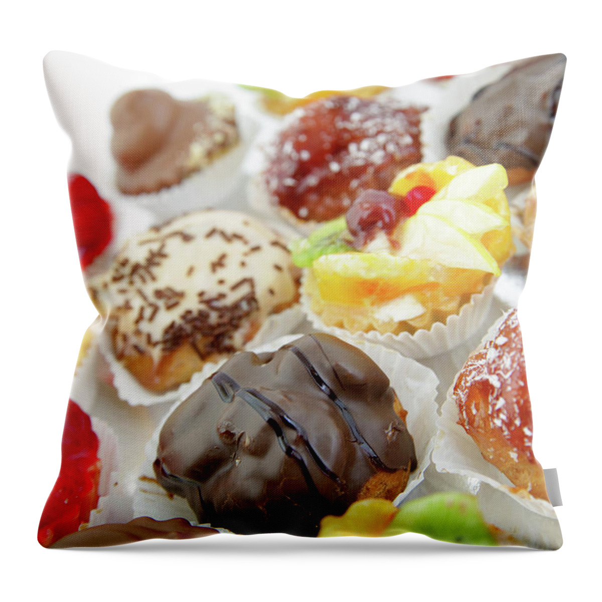 Small cakes with with different stuffing Throw Pillow by Michael
