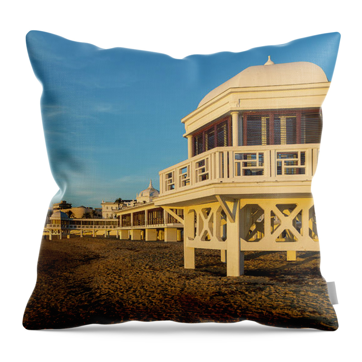 Seascape Throw Pillow featuring the photograph Spa at La Caleta under a Blue Sky Beach in Cadiz Andalusia by Pablo Avanzini