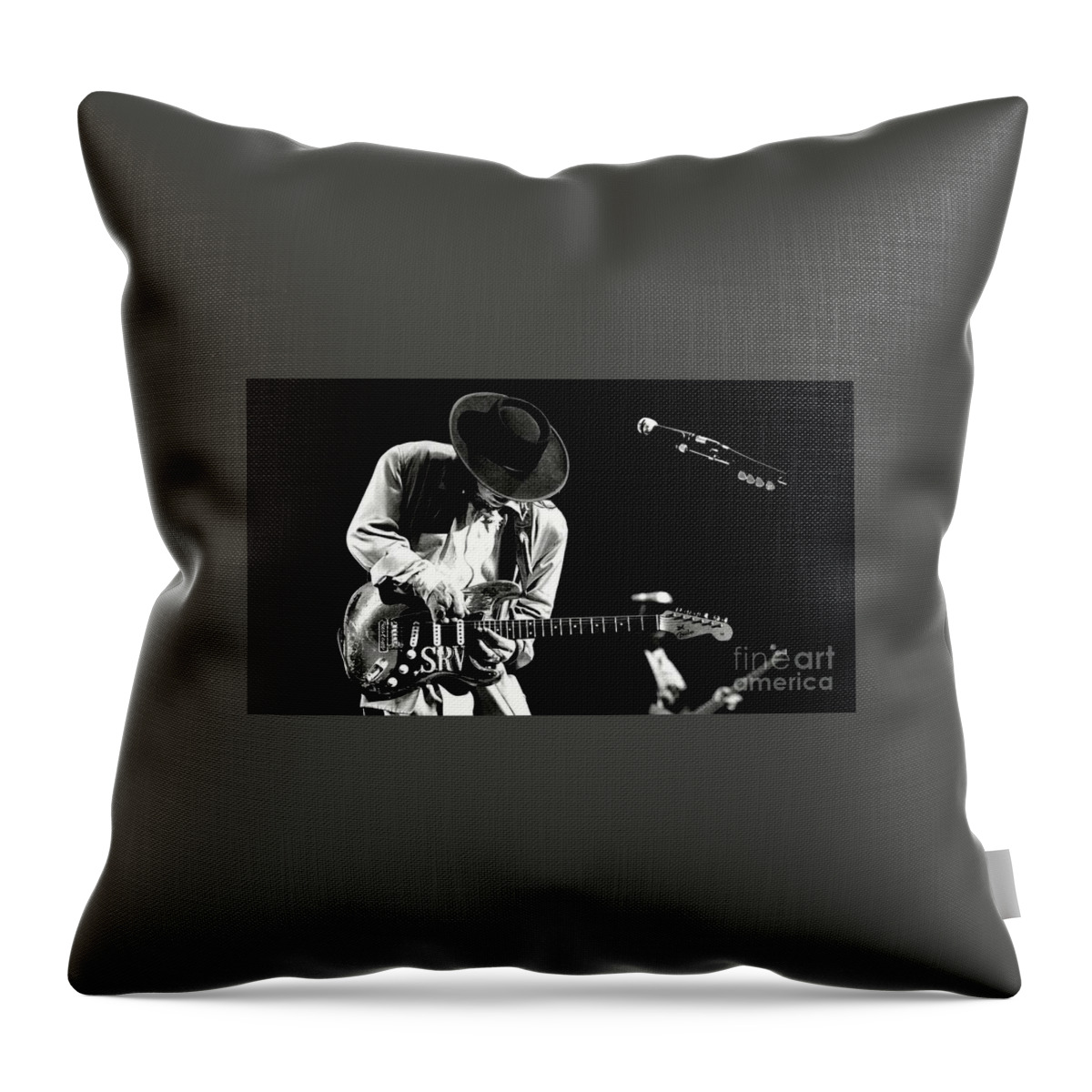 Stevie Ray Vaughan Throw Pillow featuring the photograph Stevie Ray Vaughan in concert by Action