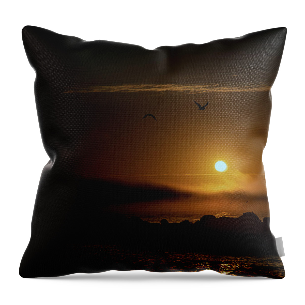 Sunset Throw Pillow featuring the photograph Sunset over the ocean by Micah Offman