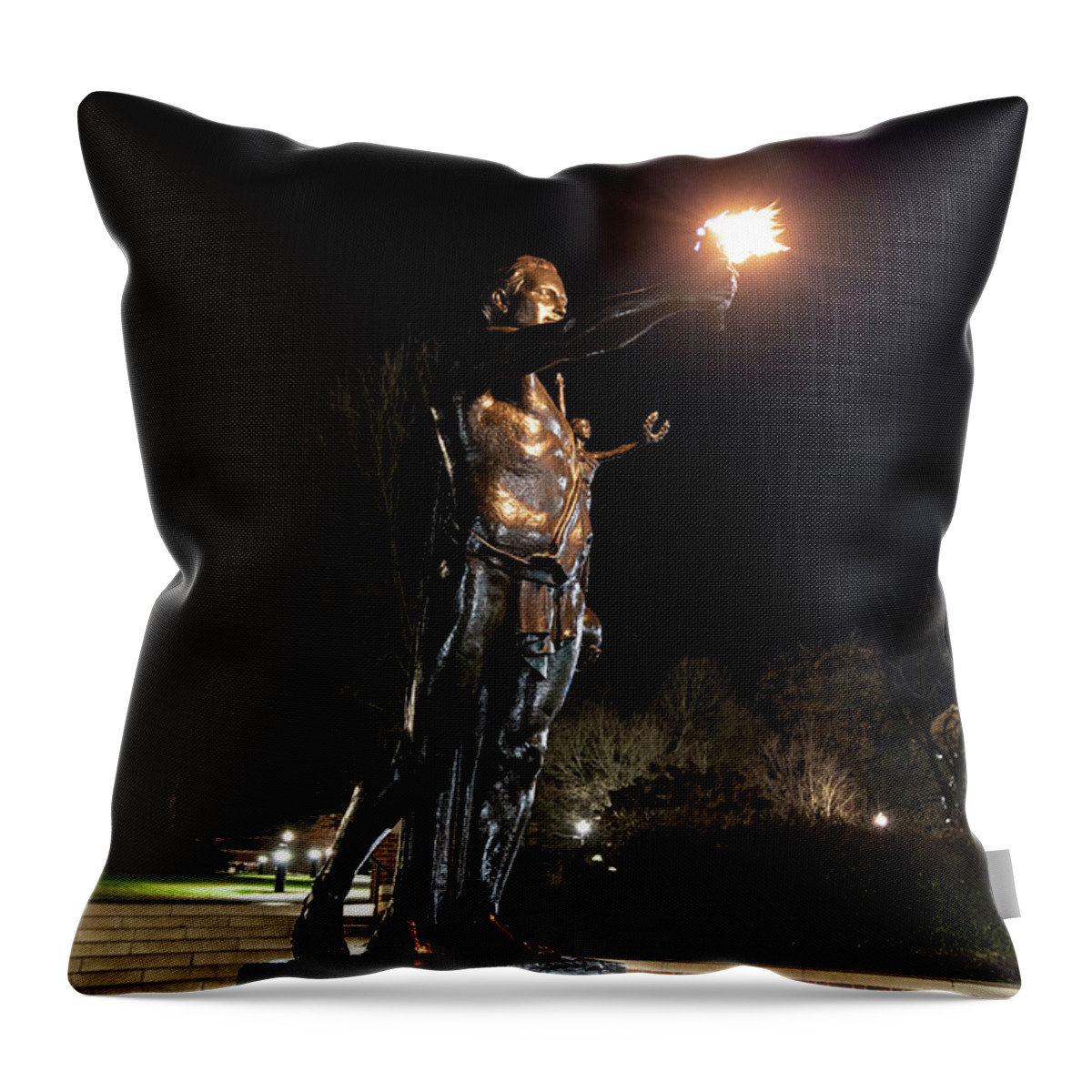 University Of Tennessee At Night Throw Pillow featuring the photograph Torchbearer statue at the University of Tennessee at night by Eldon McGraw