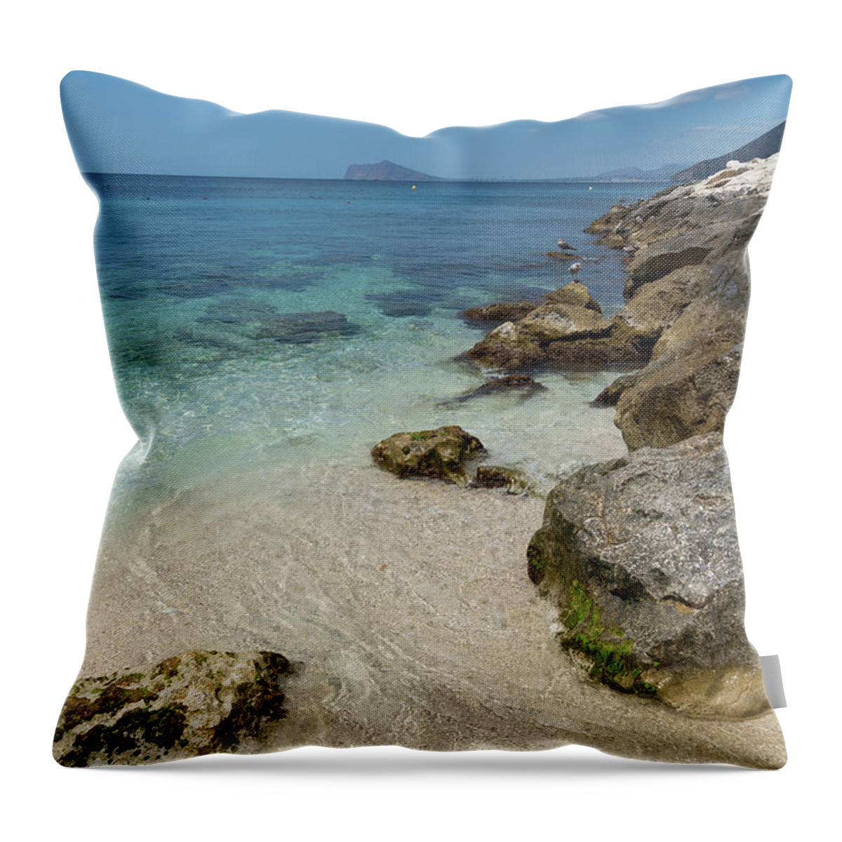 Mediterranean Throw Pillow featuring the photograph Turquoise blue sea water and rocks in Calpe 1 by Adriana Mueller