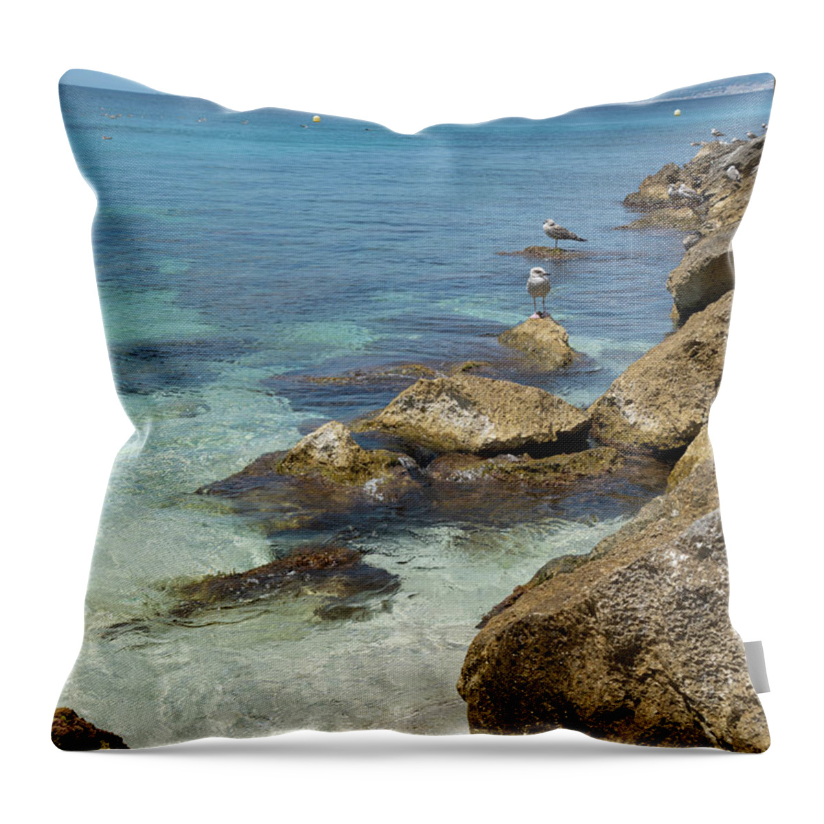 Mediterranean Throw Pillow featuring the photograph Turquoise blue sea water and rocks in Calpe 2 by Adriana Mueller