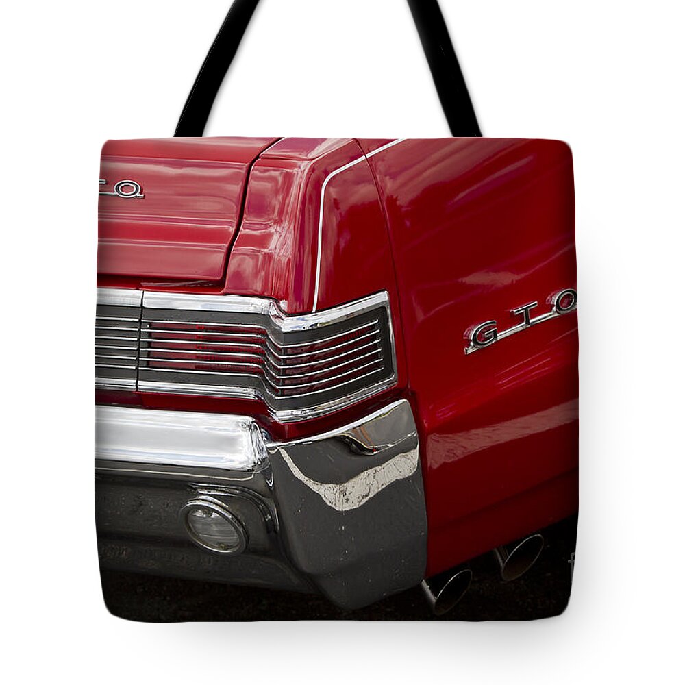 1965 Pontiac Tote Bag featuring the photograph 1965 Gto #3 by Dennis Hedberg
