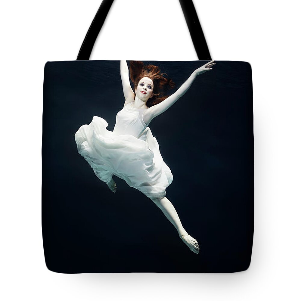 Ballet Dancer Tote Bag featuring the photograph Ballet Dancer Underwater #1 by Henrik Sorensen