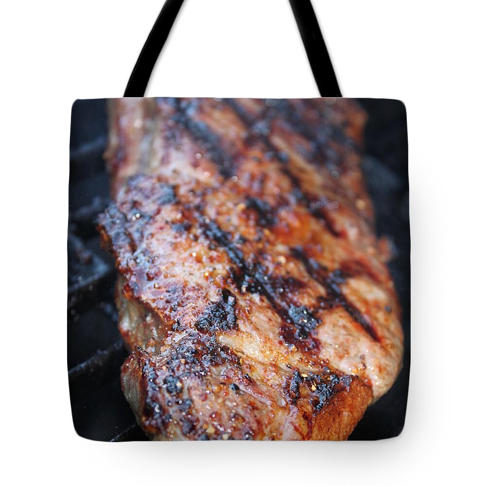 Heat Tote Bag featuring the photograph BBQ Steak #1 by Henrik Lehnerer