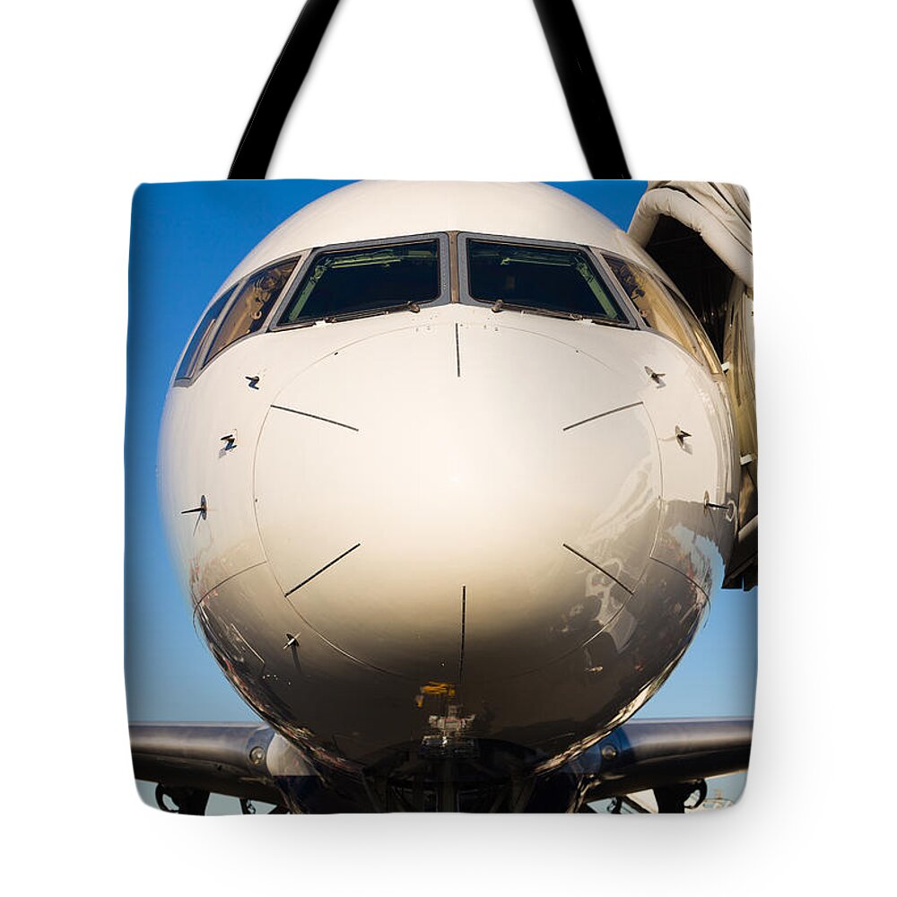 Aerospace Tote Bag featuring the photograph Commercial Airliner #1 by Raul Rodriguez