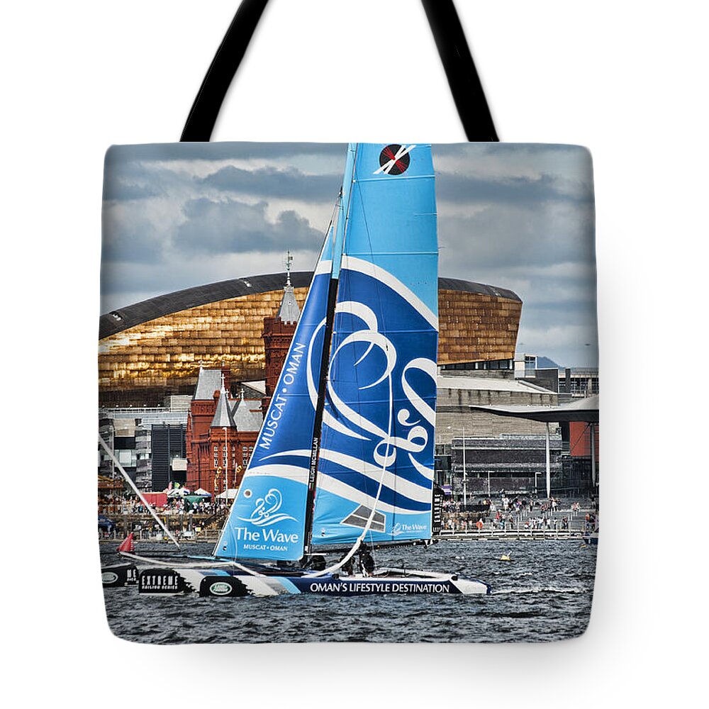 Extreme 40 Catamarans Tote Bag featuring the photograph Extreme 40 Team The Wave Muscat #1 by Steve Purnell