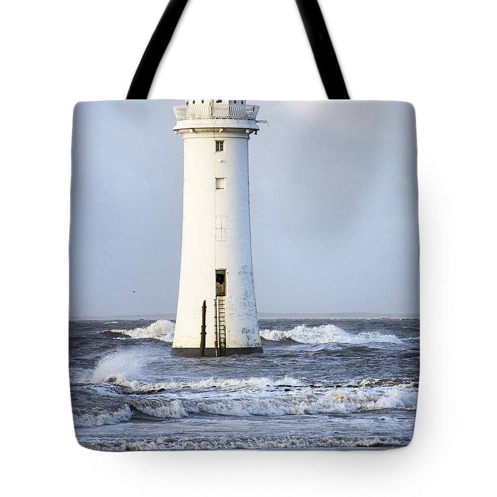 Storm Tote Bag featuring the photograph Fort Perch Lighthouse by Spikey Mouse Photography