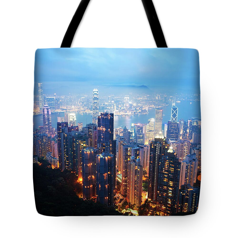 Scenics Tote Bag featuring the photograph Hong Kong Skyscrapers At Night #1 by Fzant