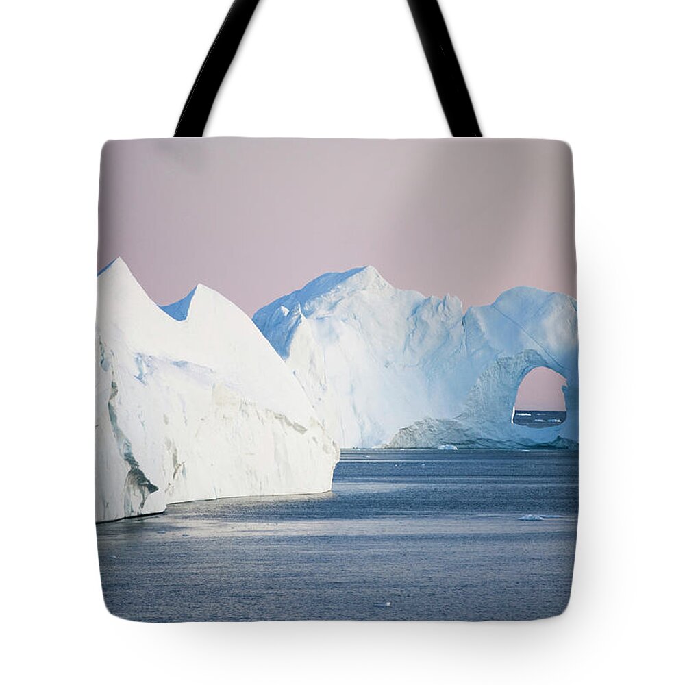 Melting Tote Bag featuring the photograph Iceberg From Ilulissat Kangerlua #1 by Holger Leue