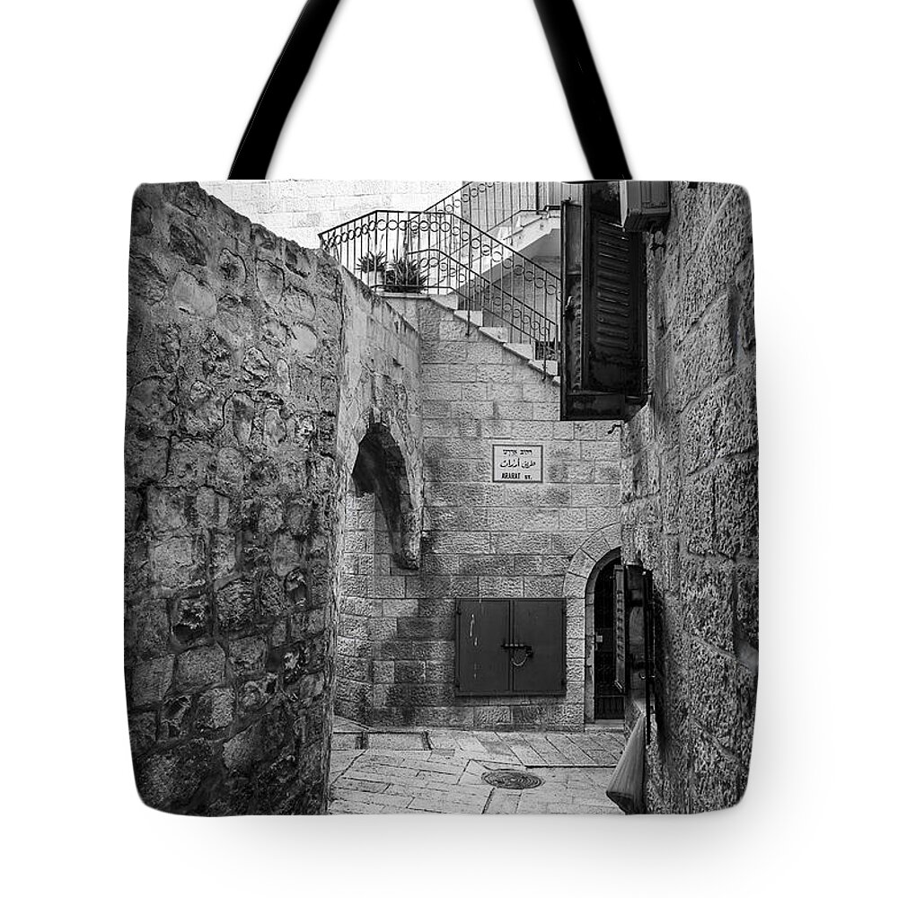 Armenian Quarter Tote Bag featuring the photograph Blue shutters, Jerusalem by Alexey Stiop