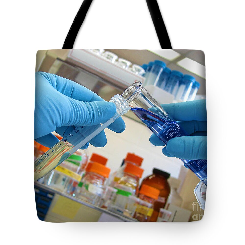 Analysis Tote Bag featuring the photograph Laboratory Experiment in Science Research Lab #1 by Olivier Le Queinec