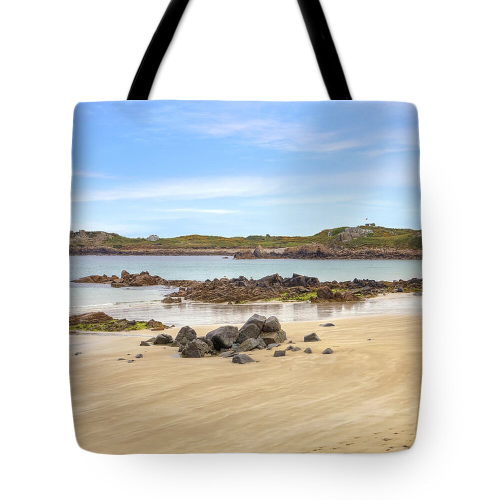 L'ancresse Bay Tote Bag featuring the photograph L'Ancresse Bay - Guernsey #1 by Joana Kruse