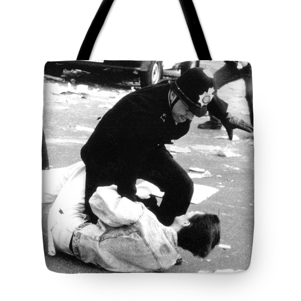 Poll Tote Bag featuring the photograph Poll Tax Riots London #1 by David Fowler