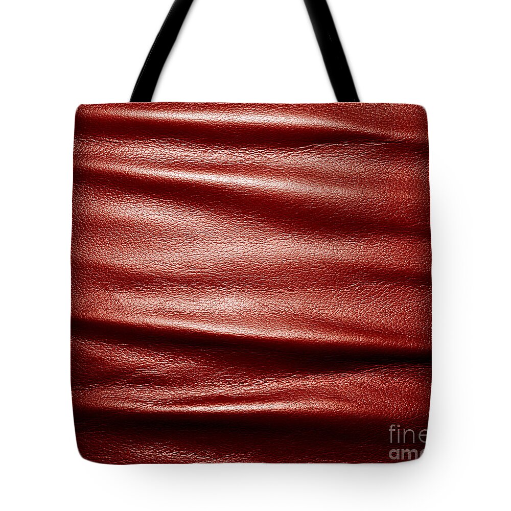 Leather Tote Bag featuring the photograph Soft wrinkled black leather #1 by Michal Bednarek