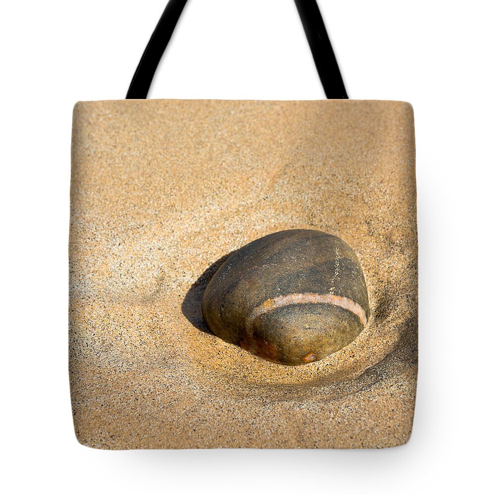 Stone Tote Bag featuring the photograph Solitude At The Beach by Andreas Berthold