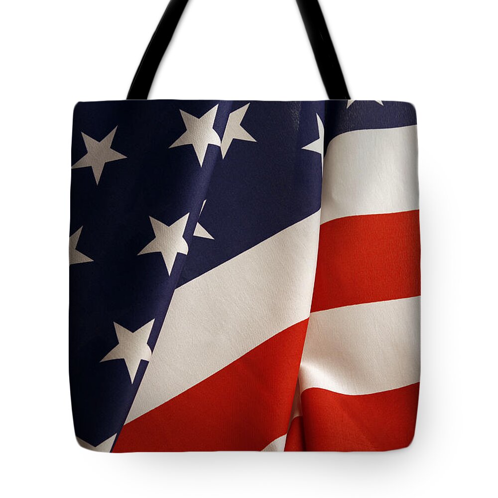 American Flag Tote Bag featuring the photograph Stars and stripes #1 by Les Cunliffe