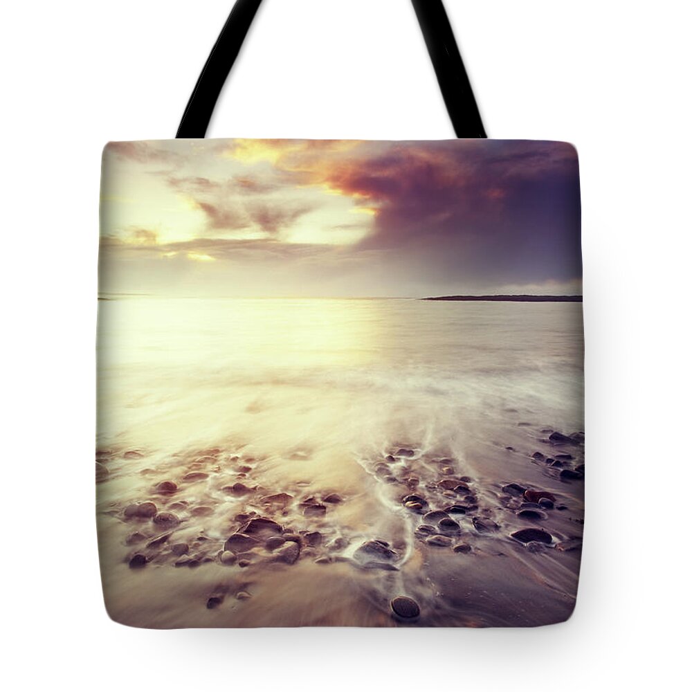 Water's Edge Tote Bag featuring the photograph Twilight At The Atlantic #1 by Mammuth