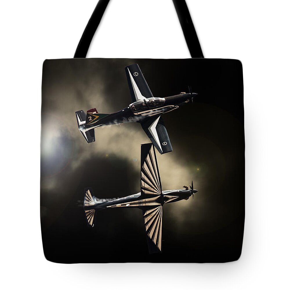 Silver Falcons Tote Bag featuring the photograph Twins #1 by Paul Job