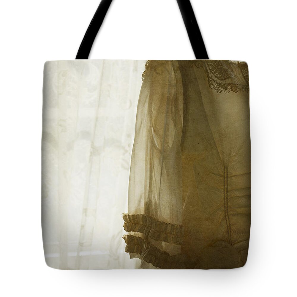 Antique Tote Bag featuring the photograph Wardrobe #1 by Margie Hurwich