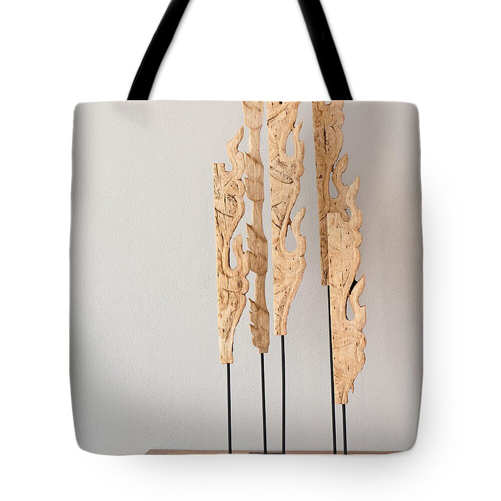 Apartment Tote Bag featuring the photograph Wood sculpture #1 by U Schade