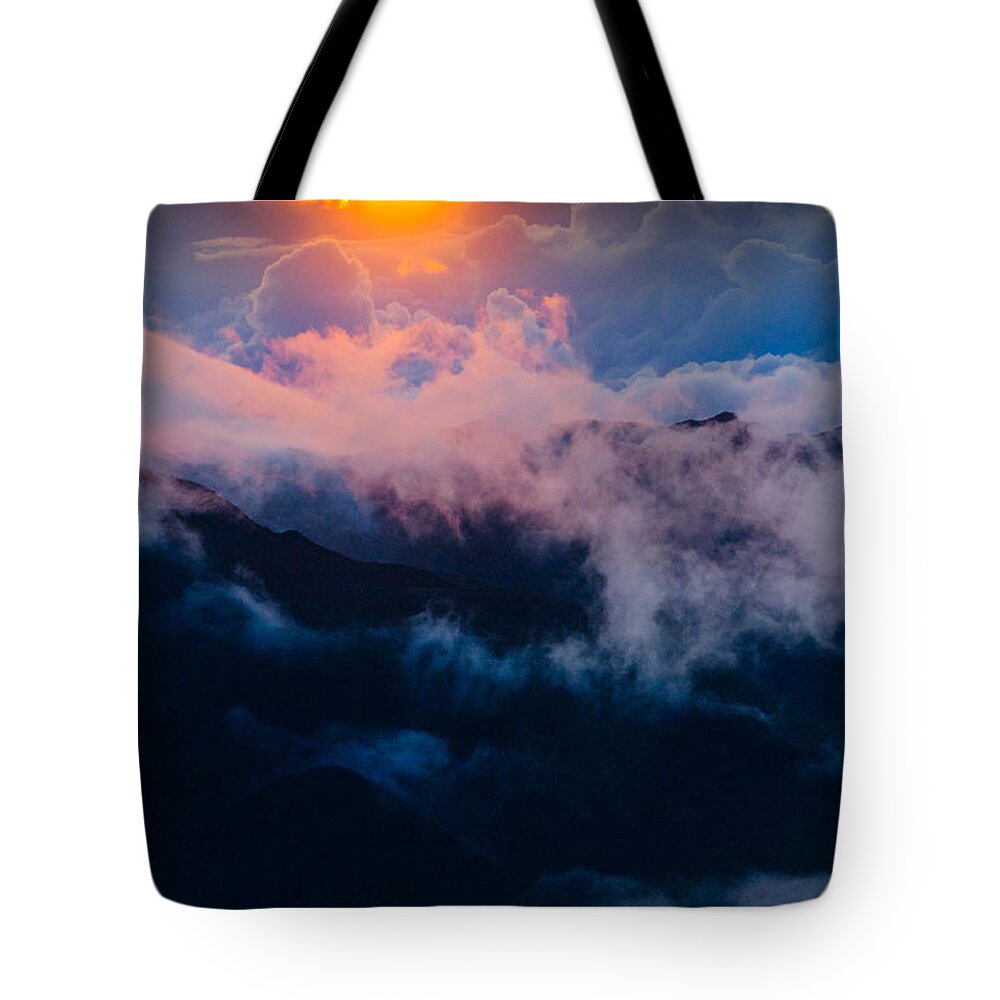 Haleakala National Park Tote Bag featuring the photograph Clouds at sunrise over Haleakala Crater Maui Hawaii USA #10 by Don Landwehrle