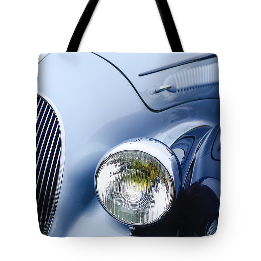 1938 Talbot-lago 150c Ss Figoni And Falaschi Cabriolet Headlight Tote Bag featuring the photograph 1938 Talbot-Lago 150C SS Figoni and Falaschi Cabriolet Headlight - Emblem by Jill Reger