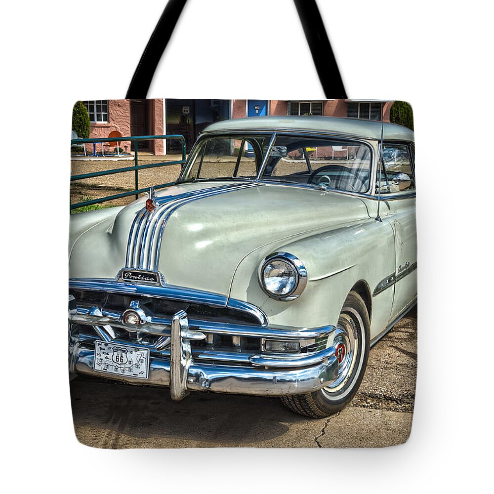 Bob And Nancy Kendrick Tote Bag featuring the photograph 1951 Pontiac Chieftain Side View by Bob and Nancy Kendrick