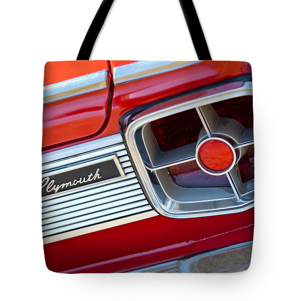 1963 Plymouth Fury Taillight Emblem Tote Bag featuring the photograph 1963 Plymouth Fury Taillight Emblem -3321c by Jill Reger