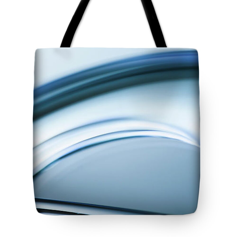 Curve Tote Bag featuring the photograph Abstract Colored Forms And Light #2 by Ralf Hiemisch