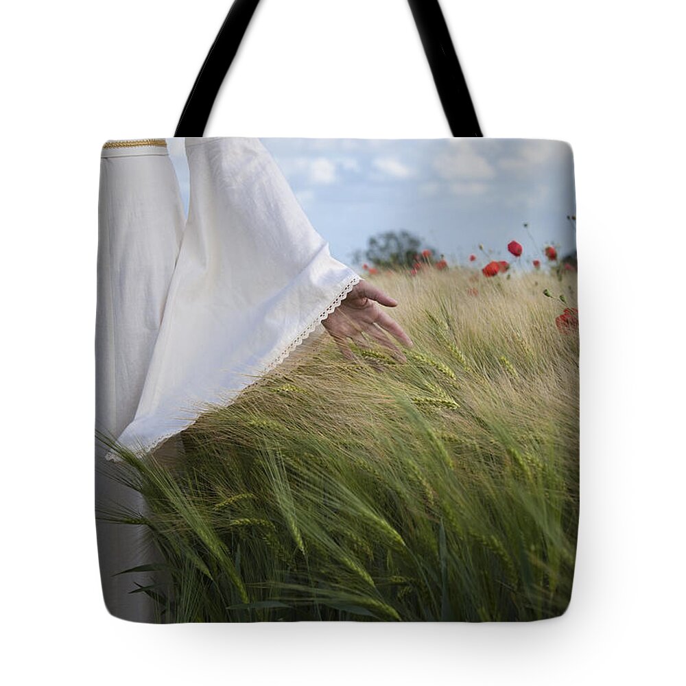 Person Tote Bag featuring the photograph Alone #2 by Maria Heyens