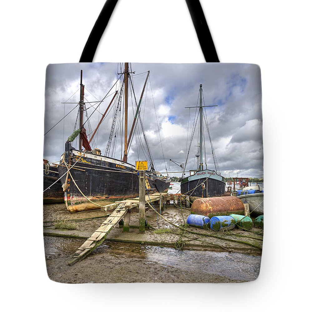 Pin Mill Tote Bag featuring the photograph Boats on the hard at Pin Mill #1 by Gary Eason