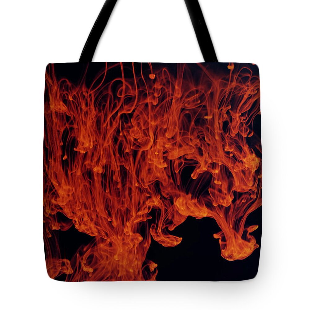 Abstract Tote Bag featuring the photograph Colored Ink Drops Falling Into Water #2 by Scott Camazine