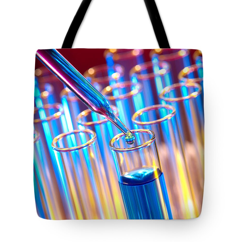 Test Tote Bag featuring the photograph Laboratory Experiment in Science Research Lab #2 by Science Research Lab