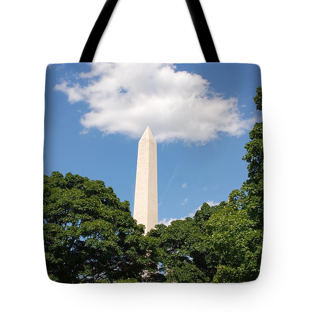 Washington Tote Bag featuring the photograph Obelisk Rises Into the Clouds by Kenny Glover