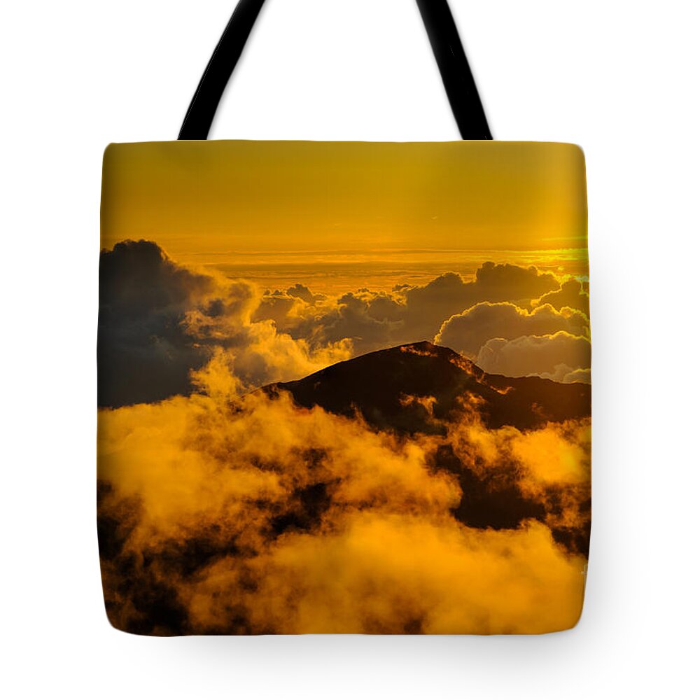 Haleakala National Park Tote Bag featuring the photograph Clouds at sunrise over Haleakala Crater Maui Hawaii USA #24 by Don Landwehrle