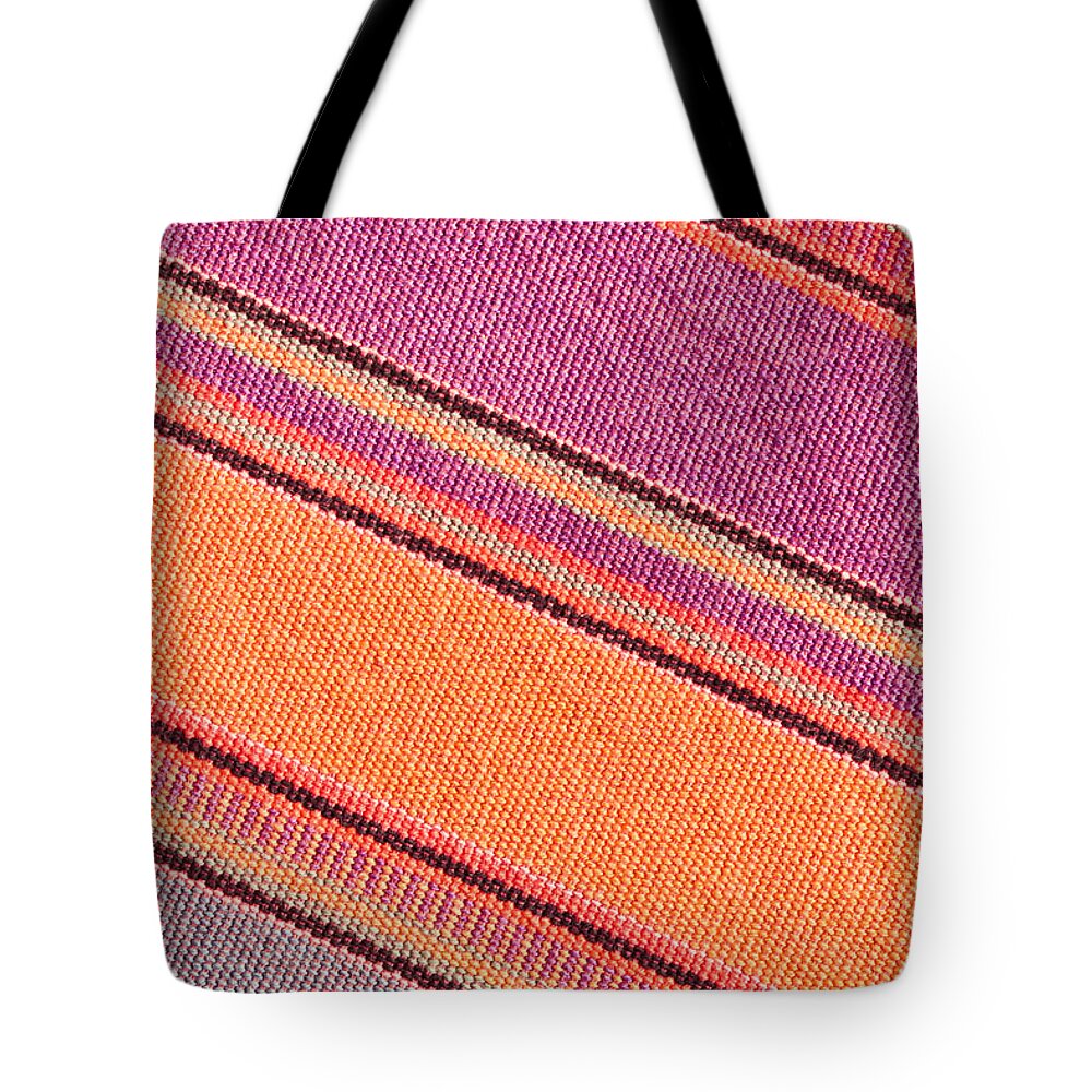 Abstract Tote Bag featuring the photograph Colorful cloth #3 by Tom Gowanlock