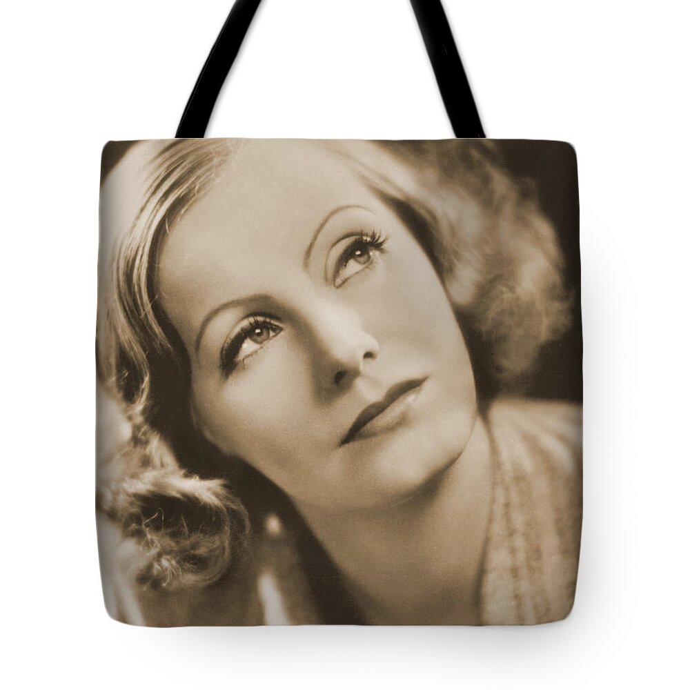 Entertainment Tote Bag featuring the photograph Greta Garbo, Hollywood Movie Star by Photo Researchers