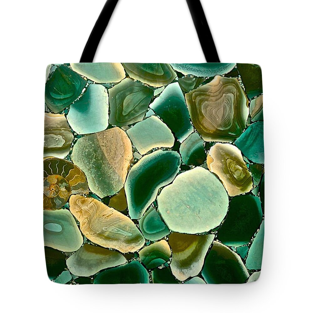 Ammonite Tote Bag featuring the photograph Ammonite Fossil With Green Pebbles by Debra Amerson