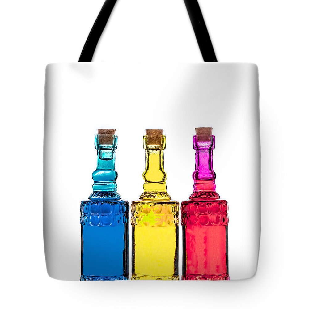 Alcohol Tote Bag featuring the photograph Colorful Bottles #4 by Peter Lakomy