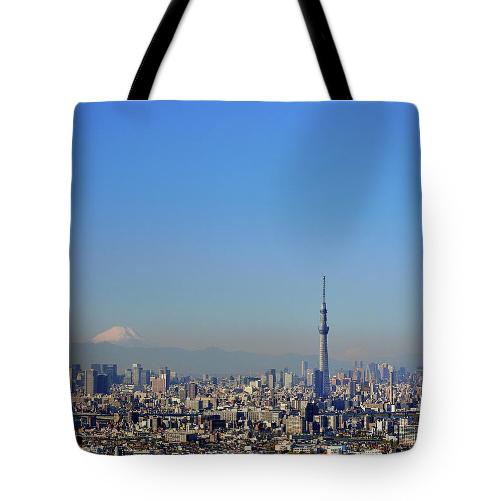 Downtown District Tote Bag featuring the photograph Tokyo Cityscape #5 by Vladimir Zakharov