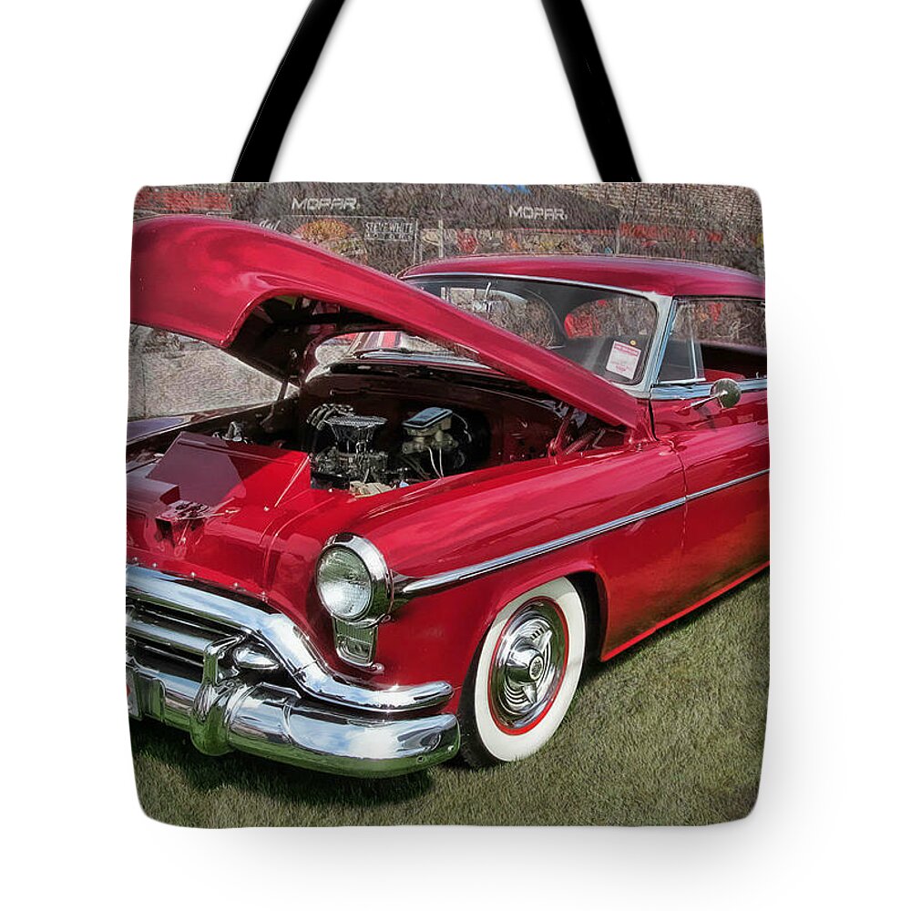 Victor Montgomery Tote Bag featuring the photograph '52 Oldsmobile #52 by Vic Montgomery
