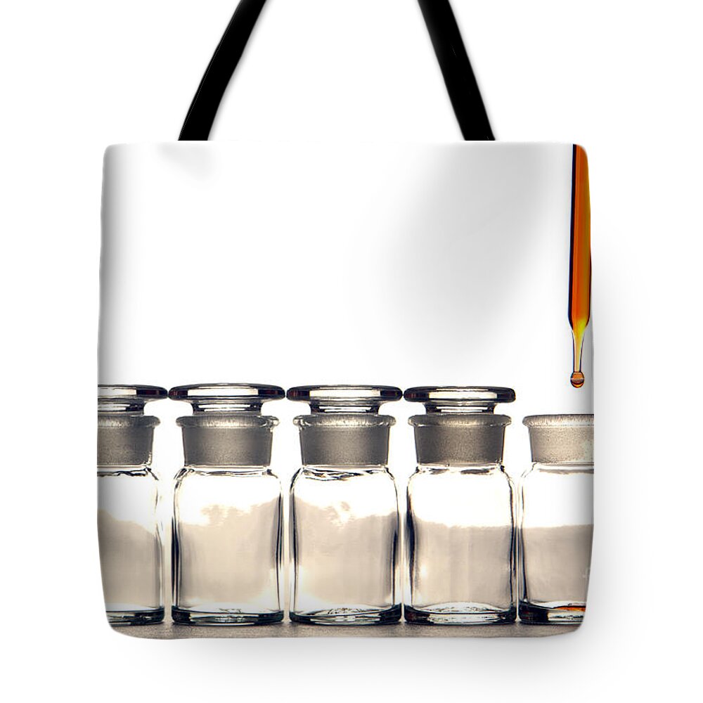 Bottles Tote Bag featuring the photograph Laboratory Experiment in Science Research Lab #53 by Science Research Lab