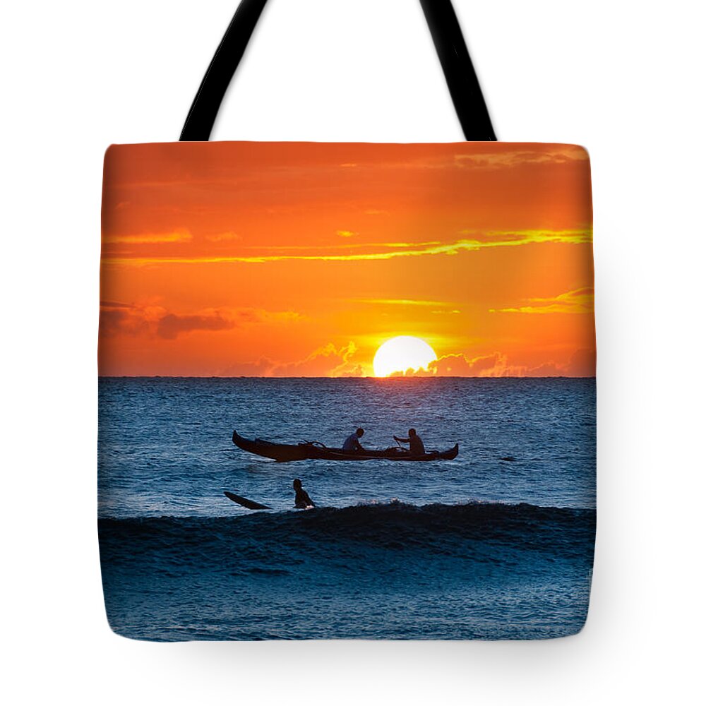 Hawaii Tote Bag featuring the photograph A boat and surfer at sunset Maui Hawaii USA by Don Landwehrle