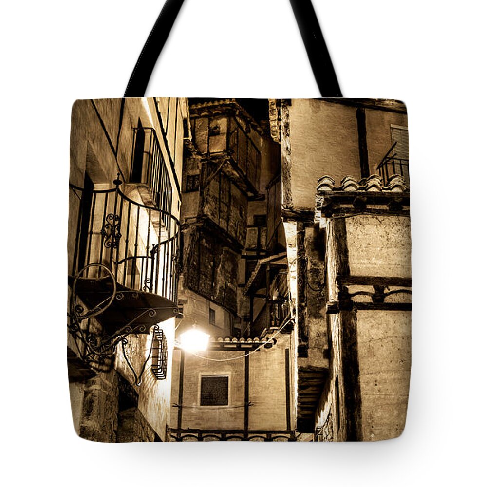 Albarracin Tote Bag featuring the photograph A couple in a Little restaurant in the ancient city of Albarracin by Weston Westmoreland