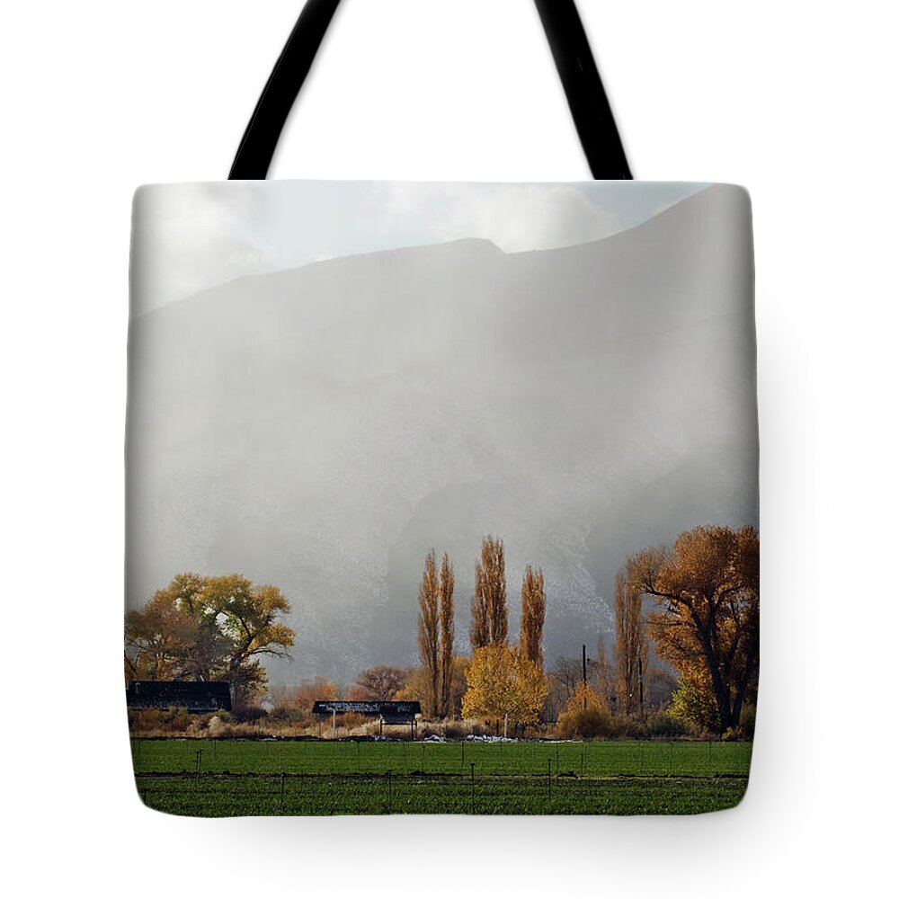 Scenics Tote Bag featuring the photograph A Farm Surrounded In Fall Color With A by Rachid Dahnoun